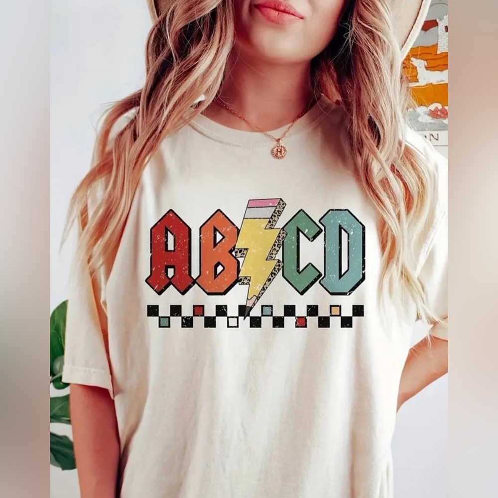 Apricot Teacher/Instructor shirt in size medium.